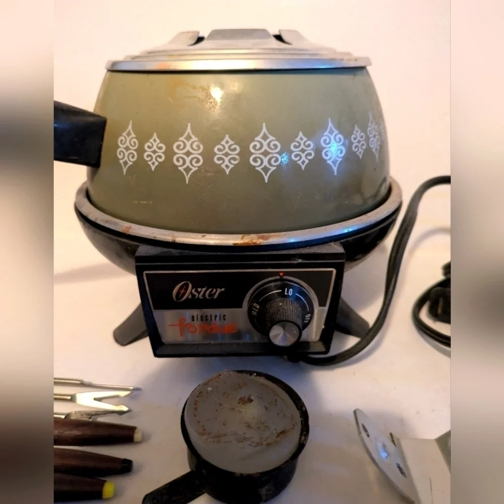 Vintage Oster Electric Fondue Set with forks.